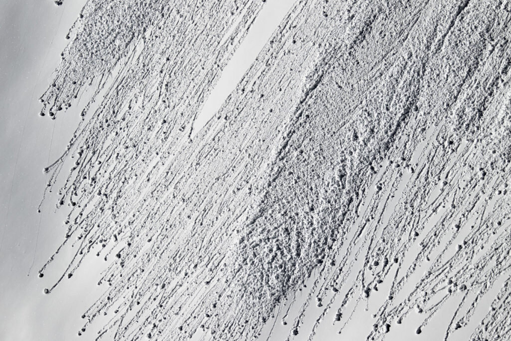abstract patterns are created from snow roller balls