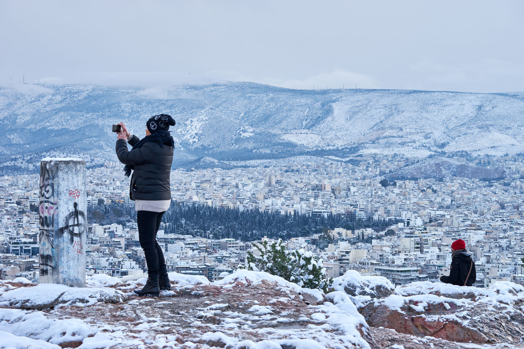 Athens in the snow captured from Filopappou Hill