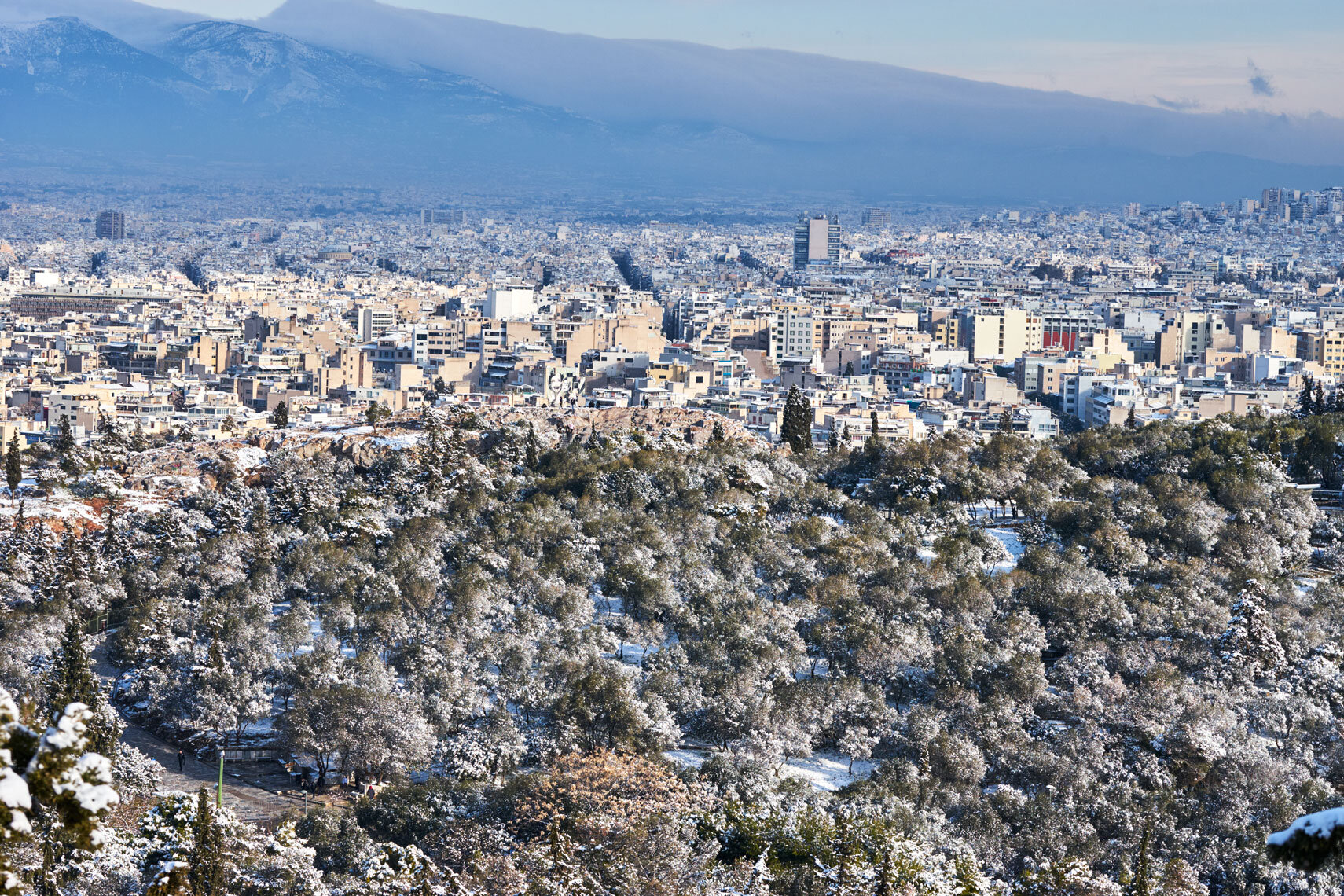 Areopagus Hill in the snow, photographed from Filiopappou Hill